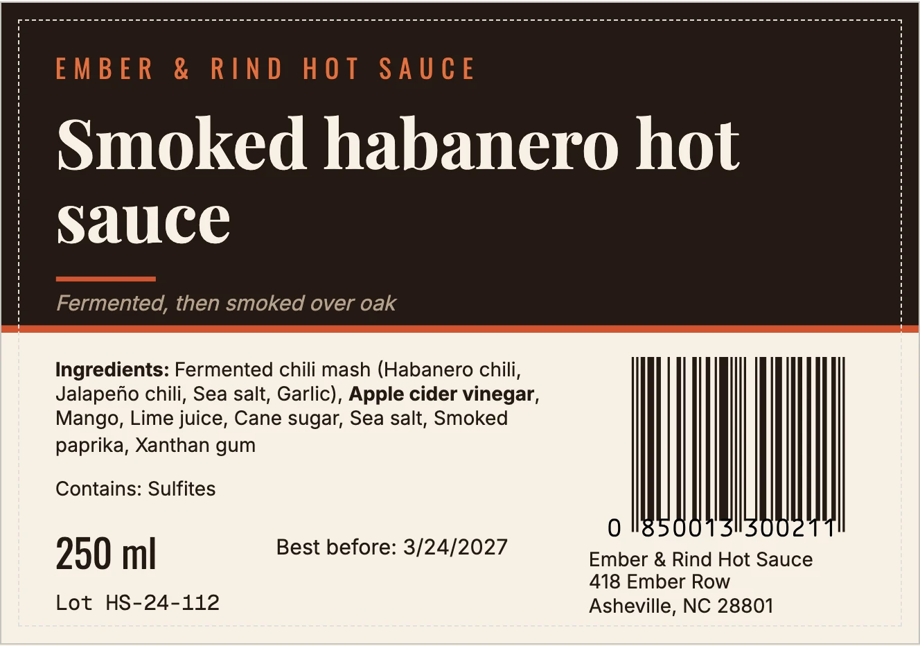 The BatchDash label editor: a hot sauce jar label on the canvas, previewed against batch RUN-000004 so it carries that batch's lot and dates, with its layers listed on the left and the selected product name showing its binding, its face and its size on the right.