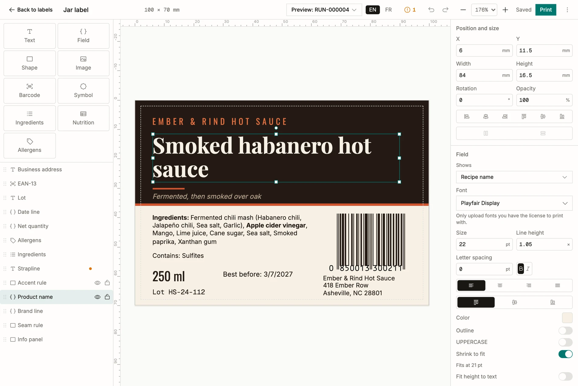 The label designer in BatchDash: a 100 × 70 mm jar label on the canvas with its preview bound to batch RUN-000004, the element palette beside it (text, field, barcode, ingredients, nutrition, allergens), and the inspector showing the selected field, what it shows and the size it fits at.